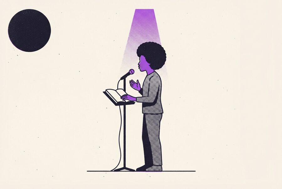 one speaker at a lectern under a single cone of light