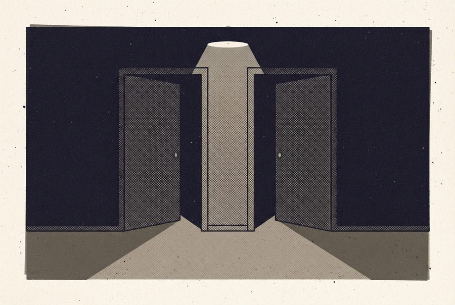 two doors standing open under a light