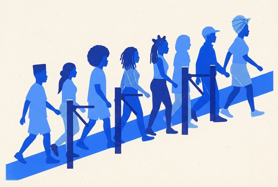 a line filing through turnstiles at a day match